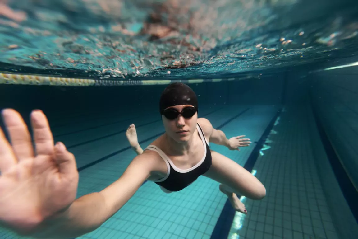 Athlete training in an Olympic-size swimming pool